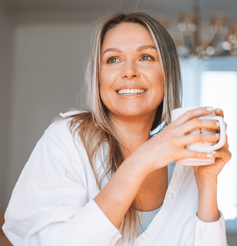 Woman enjoying a quiet morning routine at home.